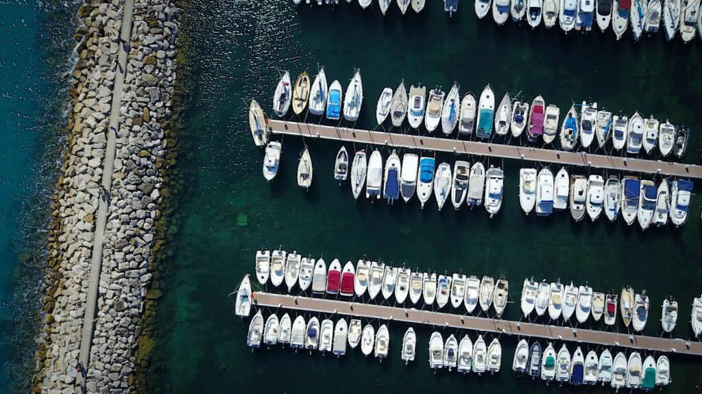boats in a marina  with a breakwater